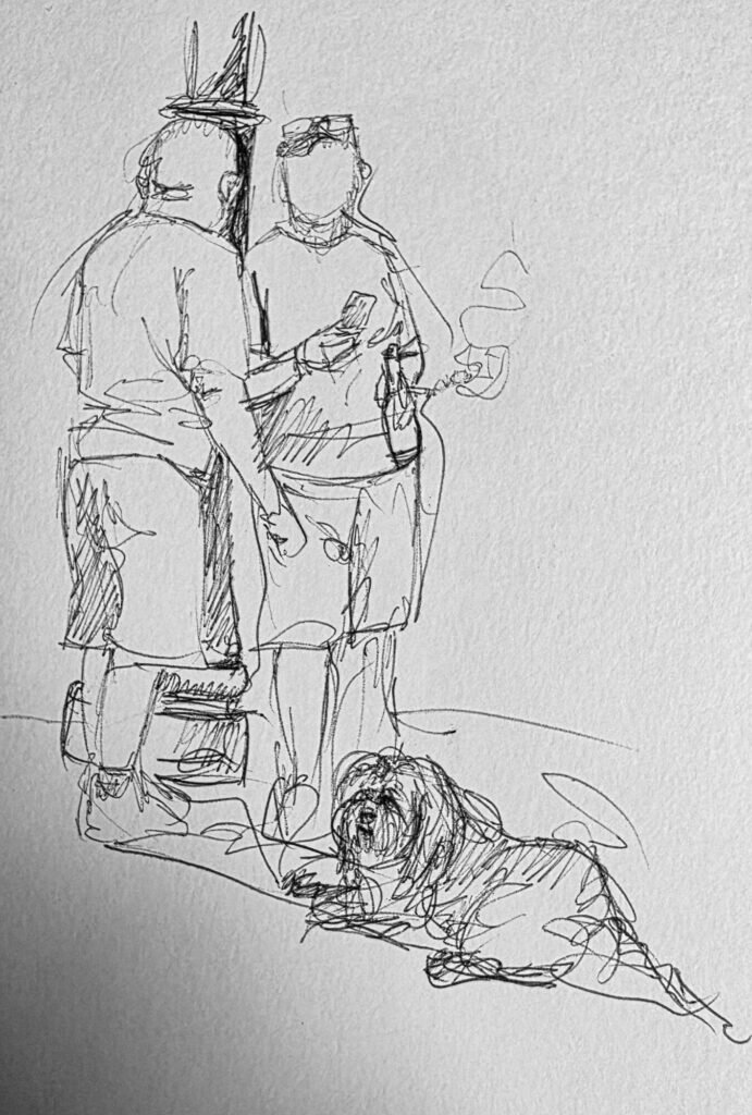Loose pen sketch of two standing figures seen from behind, one holding a phone and one smoking, with a shaggy dog lying flat in the shadow at their feet
